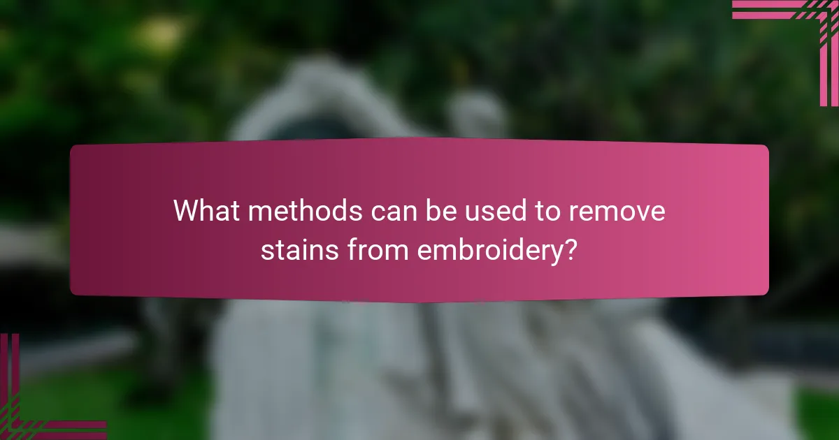 What methods can be used to remove stains from embroidery?